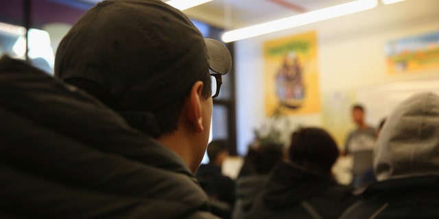 NEW YORK, NY - FEBRUARY 18: Immigrants attend a workshop for Deferred Action for Childhood Arrivals (DACA), on February 18, 2015 in New York City. The immigrant advocacy group Make the Road New York holds weekly workshops to help immigrants get legal status under DACA to work in the United States. An expansion of the national program, scheduled for this week, was frozen by a ruling from a Texas federal judge. The Obama Administration plans to appeal the ruling and, if sussessful, DACA would allow legalization of up to two million immigrants who entered the United States before they were age 16. (Photo by John Moore/Getty Images)