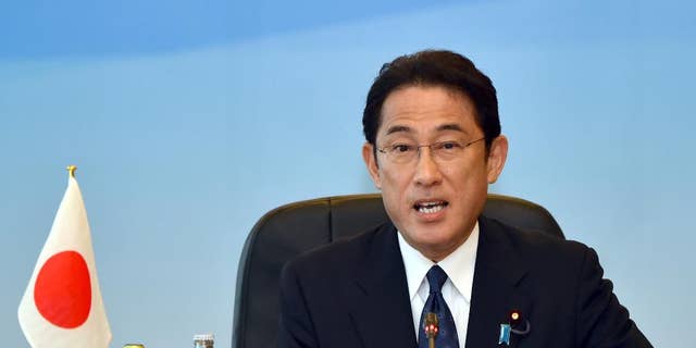 Kishida makes opening remarks during the trilateral meeting in Tokyo, Wednesday, Aug. 24, 2016.