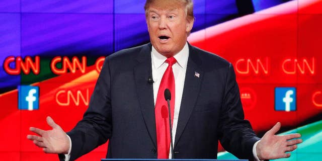Donald Trump makes a point during the CNN Republican presidential debate at the Venetian Hotel & Casino on Tuesday, Dec. 15, 2015, in Las Vegas. (AP Photo/John Locher)