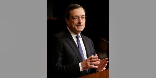 President of the European Central Bank Mario Draghi addresses an audience at the Harvard Kennedy School of Government, on the campus of Harvard University, in Cambridge, Mass., Wednesday, Oct. 9, 2013. (AP Photo/Steven Senne)