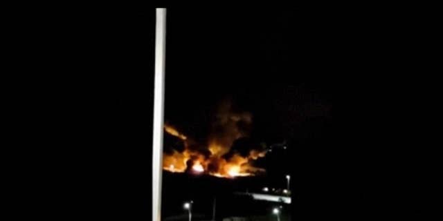 This image made from video shows the aftermath of an Israeli airstrike near a military airport west of Damascus, Syria on Friday, Jan. 13, 2016. Syria says Israel has launched missiles that hit near a military airport west of Damascus, triggering a fire. In a statement carried on the official news agency SANA, the military says the missiles were launched early on Friday and fell in the vicinity of the Mezzeh military airport. (Yomyat Kzefeh Hawen fi Dimashq via AP)