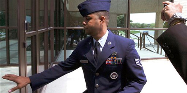July 16, 2012: U.S. Air Force Staff Sgt. Luis A. Walker arrives from a lunch break during his court martial at Lackland Air Force Base in San Antonio.