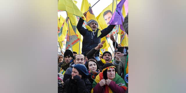 Pro-Kurdish demonstrators protesting against Turkish president Recep Tayyip Erdogan and the political repression that followed a failed military coup, in Cologne, Germany, Nov. 12, 2016.