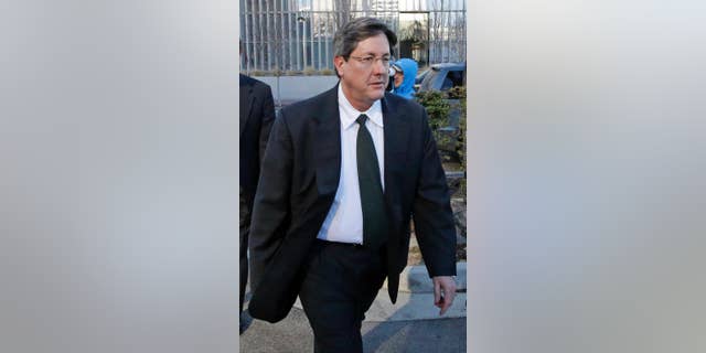 FILE - This Jan. 21, 2015 file photo, Lyle Jeffs leaves the federal courthouse in Salt Lake City. Authorities say Utah polygamous sect leader Jeffs likely used olive oil or another lubricant to slip off his GPS ankle monitor and escape home confinement last June 2016. Jeffs was supposed to be on home confinement pending trial in an alleged multimillion-dollar food stamp fraud scheme. (AP Photo/Rick Bowmer, File)