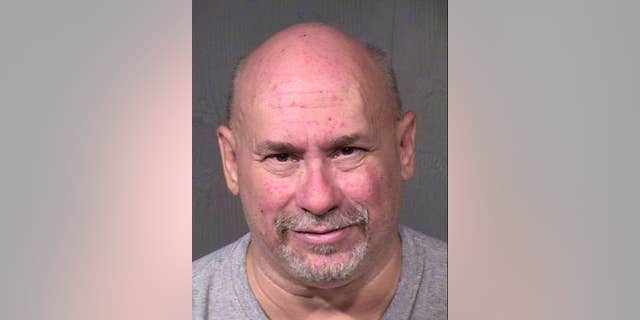 This undated booking photo provided by the Maricopa County Sheriff shows William James Hartwell, who is scheduled to go on trial next week on charges that his pornography-production studio near Phoenix's airport operated as a front for a prostitution ring. Hartwell denies the allegations and accuses the government of criminalizing actions protected by the First Amendment. Prosecutors say Hartwell's actions aren't constitutionally protected. (Maricopa County Sheriff via AP)
