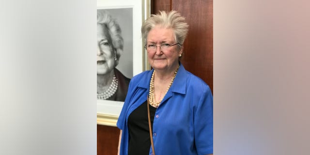 "She was a treasure to her family and our nation," Barbara Roach, a former teacher, said. "I'm very thankful and so in her honor I'm wearing blue and pearls."