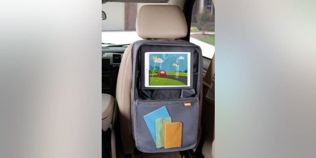 This handy backseat holder displays your favorite tablet while also keeping other knick knacks organized.