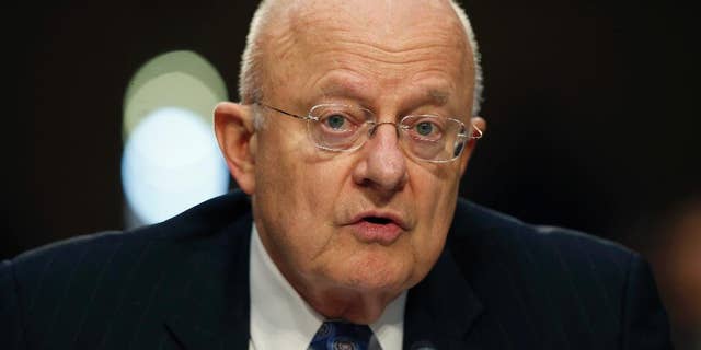 FILE - In this Feb. 9, 2016, file photo, Director of the National Intelligence James Clapper speaks on Capitol Hill in Washington. Clapper said Sept. 20 that he could never agree with a decision to pardon Edward Snowden. Snowden was an National Security Agency contract employee when he took more than a million documents and leaked them to journalists who revealed massive domestic surveillance programs begun in the aftermath of the 9/11 attacks. (AP Photo/Alex Brandon, File)