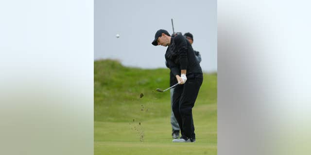 Rory McIlroy of Northern Ireland hits a shot from the 3rd fairway during the third round of the British Open Golf Championship at the Royal Troon Golf Club in Troon, Scotland, Saturday, July 16, 2016. (AP Photo/Matt Dunham)