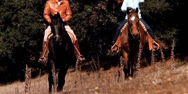 President Ronald Reagan and his wife, first lady Nancy Reagan, horseback riding at their ranch, Rancho del Cielo, near Santa Barbara, California in May 1982.