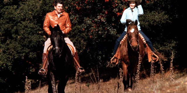 President Ronald Reagan and his wife, first lady Nancy Reagan, horseback riding at their ranch, Rancho del Cielo, near Santa Barbara, California in May 1982.