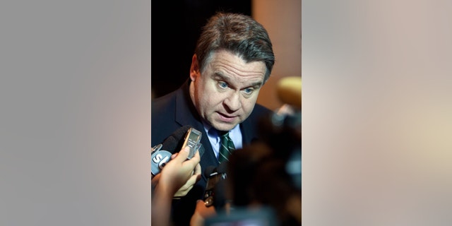 File- This Dec. 17, 2009, file photo shows U.S. Rep. Chris Smith speaking to members of the media in Rio de Janeiro. “New Jersey has a huge trafficking problem,” said Smith, R-N.J., who is also co-chairman of the House anti-human trafficking caucus. “One Super Bowl after another after another has shown itself to be one of the largest events in the world where the cruelty of human trafficking goes on for several weeks.” (AP Photo/Felipe Dana, File)