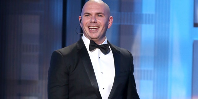 Pitbull hosting the 42nd annual American Music Awards Nov. 23, 2014, in Los Angeles.