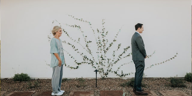 The couple, moments before the first look.