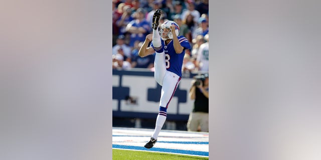 FILE - In this Oct. 9, 2011, file photo, Buffalo Bills punter Brian Moorman punts against the Philadelphia Eagles during the second half of an NFL football game in Orchard Park, N.Y. A year after being released by the Bills, Moorman is picking up where he left off with a team he spent his first 11-plus NFL seasons with after being re-signed last weekend. (AP Photo/David Duprey, File)