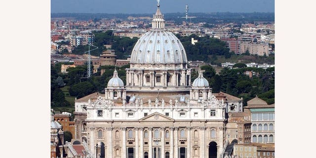 file -- An Aug. 14, 2005 file photo shows an aerial view of St. Peter's Basilica at the Vatican.  A letter Monday May 16, 2011, from the Congregation for the Doctrine of the Faith has told bishops around the world to cooperate with police in reporting priests who rape and molest children and to develop guidelines for preventing abuse by May 2012.    (AP Photo/Plinio Lepri, file)