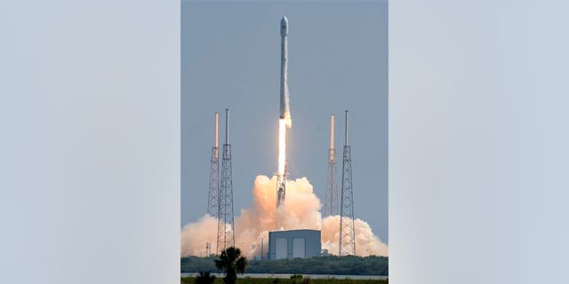 A SpaceX Falcon 9 rocket blasts off from Cape Canaveral Air Force Station Wednesday morning, June 15, 2016, carrying a pair of commercial communications satellites. (Craig Bailey/Florida Today via AP)