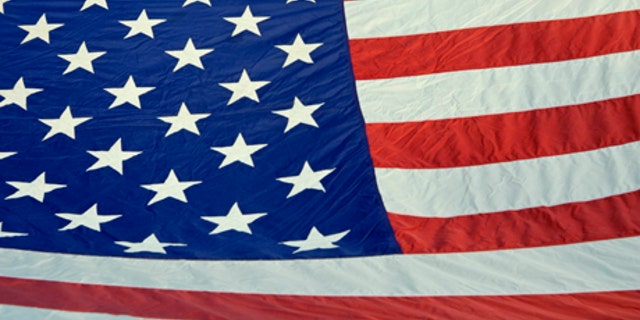 A Texas man claims he was forced to remove an American flag like this one from his balcony.
