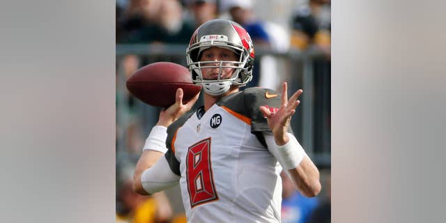 Tampa Bay Buccaneers quarterback Mike Glennon passes in the third quarter of an NFL football game against the Pittsburgh Steelers, Sunday, Sept. 28, 2014, in Pittsburgh. The Buccaneers won 27-24. (AP Photo/Gene J. Puskar)