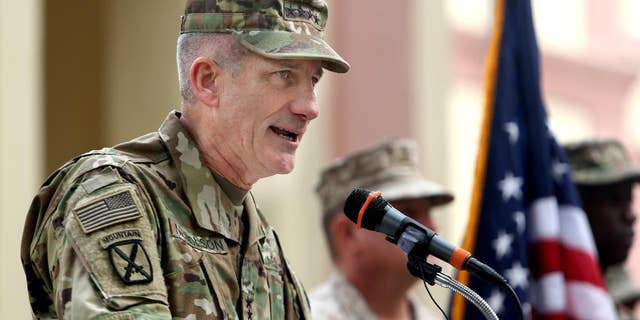 FILE - In this Wednesday, March 2, 2016 file photo, new U.S. commander in Afghanistan, U.S. Army Gen. John Nicholson speaks during a change of command ceremony at the Resolute Support Headquarters in Kabul, Afghanistan. President Barack Obama's decision to allow more aggressive U.S. military action in support of Afghan combat operations against the Taliban could have a game-changing effect on the long war, Gen. John Nicholson, the top U.S. commander in Afghanistan, said Saturday, July 16, 2016. (AP Photo/Rahmat Gul, File)