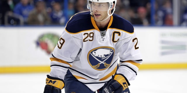 FILE - In this March 26, 2013, file photo, Buffalo Sabres right wing Jason Pominville skates against the Tampa Bay Lightning during the first period of an NHL Hockey game in Tampa, Fla. A person familiar with trade talks has confirmed the Sabres have agreed to deal their captain to the Minnesota Wild on Wednesday, April 3, 2013. The person spoke on the condition of anonymity because the trade has not yet been approved by the NHL. (AP Photo/Chris O'Meara, File)