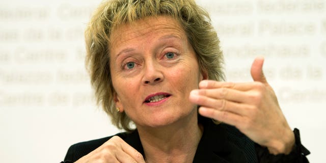 Swiss Federal Council Eveline Widmer-Schlumpf speaks about the budget 2014 during a press conference in Bern, Switzerland Wednesday, Feb. 13, 2013. The Swiss government took action Wednesday to stop the country's housing market from running out of control by requiring banks to hold more capital reserves. The nation's governing Federal Council in Bern, Switzerland, which includes the president and six other ministers, announced that it is "taking action against an excessive rise in prices in the real estate market and exorbitant mortgage debt" that threatens Swiss banks and the economy. (AP Photo/Keystone,Peter Schneider)
