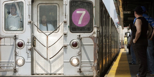 NEW YORK - JUNE 19: A commuter waits to ride the 7 subway train June 19, 2006 in New York City. U.S. officials reportedly learned in 2003 that al-Qaida operatives planned to release deadly gas into the city's subway stystem and then called off the attack.. (Photo by Mario Tama/Getty Images)