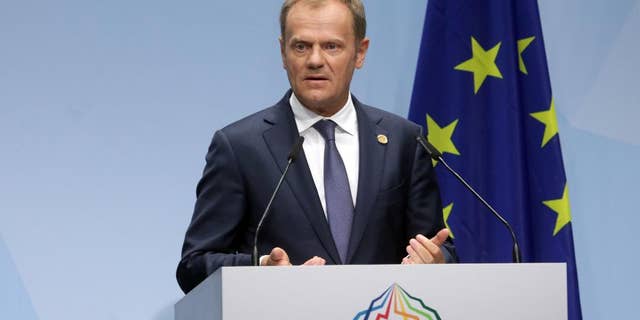 European Council President Donald Tusk speaks during a media conference at the G-7 summit at Schloss Elmau hotel near Garmisch-Partenkirchen, southern Germany, Sunday, June 7, 2015. The two-day summit will address such issues as climate change, poverty and the situation in Ukraine. (AP Photo/Virginia Mayo)