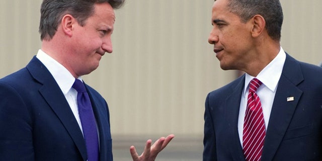 June 26: President Obama and British Prime Minister Cameron talk at the conclusion of the G20 conference in Ontario, Canada.
