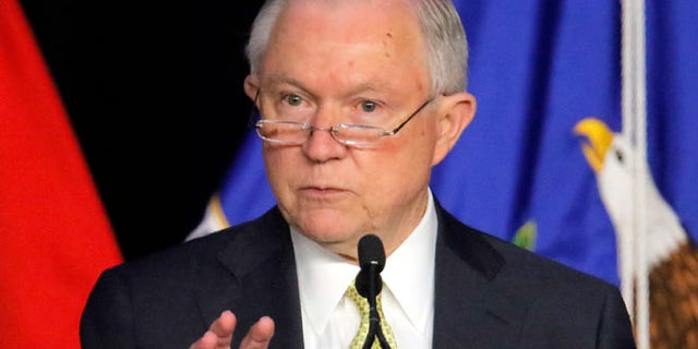 U.S. Attorney General Jeff Sessions speaks at the opening session of the National Law Enforcement Conference on Human Exploitation at the Sheraton Atlanta Hotel, Tuesday morning, June 6, 2017, in Atlanta. (Bob Andres/Atlanta Journal-Constitution via AP)