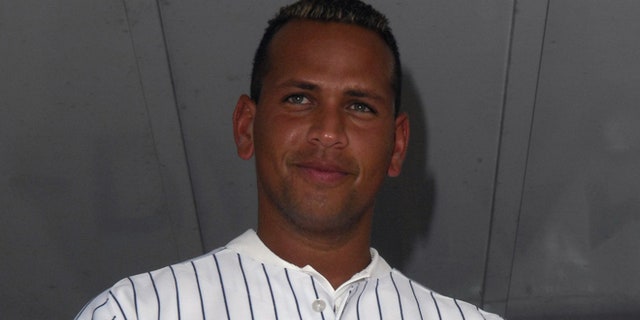 MIAMI , FL - JANUARY 21: Alex Rodriguez is wearing the jersey that he auctioned off at Family Fun Day benefiting the AROD Family Foundation and Ronald McDonald House Charities at The Miami Seaquarium on January 21, 2007 in Miami, Florida. (Photo by Gustavo Caballero/Getty Images for Arod Corporation)