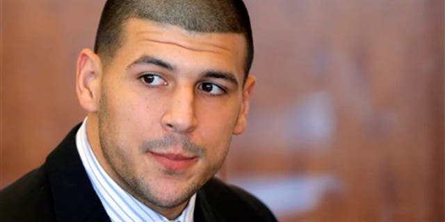 FILE - In this Oct. 9, 2013 file photo, former New England Patriots NFL football player Aaron Hernandez attends a pretrial court hearing in Fall River, Mass. Hernandez has pleaded not guilty in the killing of 27-year-old Odin Lloyd, a semi-professional football player from Boston who was dating the sister of Hernandez's girlfriend. On Monday, Dec. 16, 2013, Lloyd's family filed a wrongful death suit against Hernandez in court in New Bedford, Mass. (AP Photo/Brian Snyder, Pool, File)