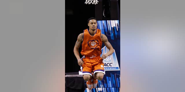 Clemson's K.J. McDaniels warms up during an NCAA college basketball practice for the Atlantic Coast Conference tournament in Greensboro, N.C., Tuesday, March 11, 2014. (AP Photo/Gerry Broome)