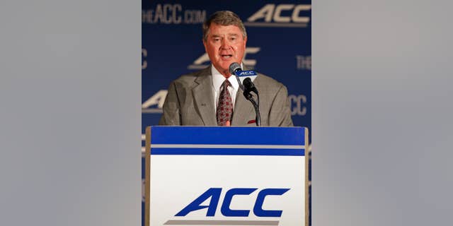 Atlantic Coast Conference commissioner John Swofford speaks during a news conference at the Atlantic Coast Conference Football kickoff in Greensboro, N.C., Sunday, July 20, 2014. (AP Photo/Chuck Burton)