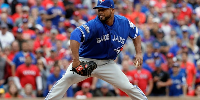Toronto Blue Jays relief pitcher Francisco Liriano throws against the Texas Rangers in the eighth inning of Game 2 of baseball's American League Division Series, Friday, Oct. 7, 2016, in Arlington, Texas. (AP Photo/David J. Phillip)