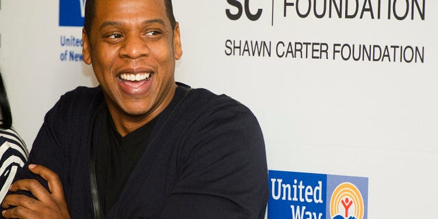 Shawn "Jay Z" Carter attends a press event to announce his Carnegie Hall performances to benefit the United Way and the Shawn Carter Scholarship Foundation, in New York, Thursday, Dec. 8, 2011. (AP Photo/Charles Sykes)