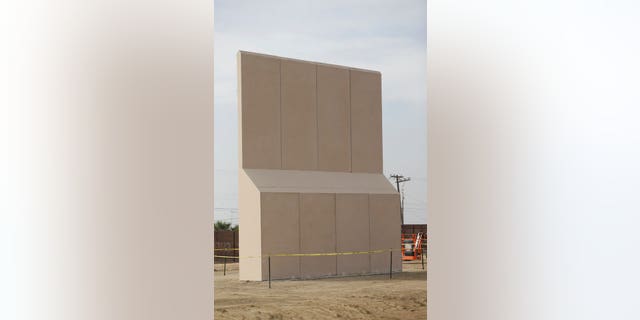 A border wall prototype stands near the border with Tijuana, Mexico, Thursday, Oct. 19, 2017, in San Diego. Companies are nearing an Oct. 26 deadline to finish building eight prototypes of President Donald Trump's proposed border wall with Mexico. (AP Photo/Gregory Bull)