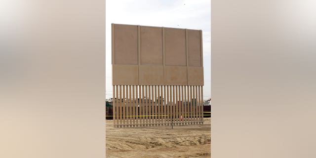 A border wall prototype stands near the border with Tijuana, Mexico, Thursday, Oct. 19, 2017, in San Diego. Companies are nearing an Oct. 26 deadline to finish building eight prototypes of President Donald Trump's proposed border wall with Mexico. (AP Photo/Gregory Bull)