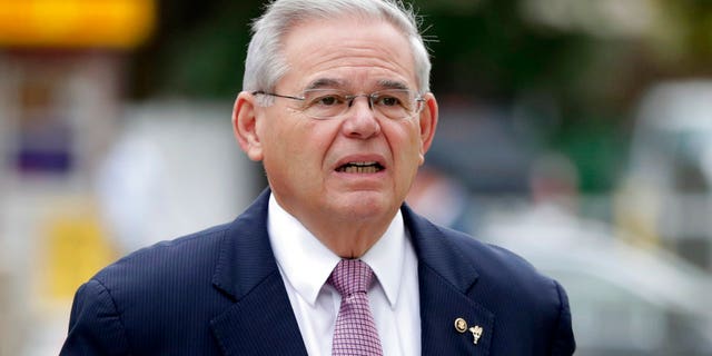 U.S. Sen. Bob Menendez arrives at the Martin Luther King, Jr., Federal Courthouse for his federal corruption trial, Thursday, Oct. 26, 2017, in Newark, N.J. (AP Photo/Julio Cortez)