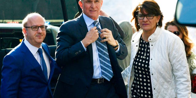 Former National Security Adviser Michael Flynn, at center, pleaded guilty to making false statements to the FBI as part of Special Counsel Robert Mueller's investigation.