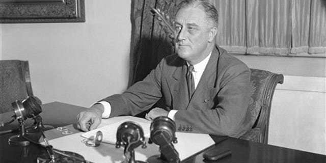 President Franklin D. Roosevelt at his desk in the White House, May 7, 1933.