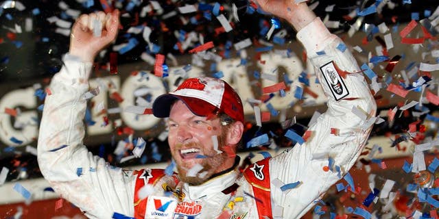 FILE - In this Feb. 23, 2014 file photo, Dale Earnhardt Jr. celebrates in Victory Lane after winning the NASCAR Daytona 500 Sprint Cup series auto race at Daytona International Speedway in Daytona Beach, Fla. As NASCAR heads West for a two-race swing through Phoenix and Las Vegas, the challenge becomes duplicating the Daytona 500 so that the remaining 36 events are half as exciting. (AP Photo/Terry Renna, File)