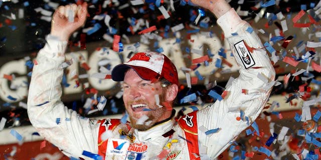 FILE - In this Feb. 23, 2014 file photo, Dale Earnhardt Jr. celebrates in Victory Lane after winning the NASCAR Daytona 500 Sprint Cup series auto race at Daytona International Speedway in Daytona Beach, Fla. As NASCAR heads West for a two-race swing through Phoenix and Las Vegas, the challenge becomes duplicating the Daytona 500 so that the remaining 36 events are half as exciting. (AP Photo/Terry Renna, File)