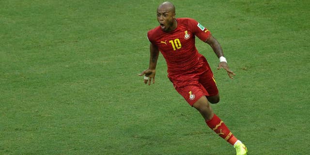 Ghana's Andre Ayew celebrates scoring his side's first goal during the group G World Cup soccer match between Germany and Ghana at the Arena Castelao in Fortaleza, Brazil, Saturday, June 21, 2014. (AP Photo/Themba Hadebe)