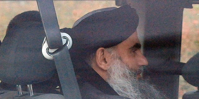 Nov. 13, 2012: Islamic cleric Abu Qatada is driven out of Long Lartin high security prison in Worcestershire,  England, after winning the latest round in his battle against deportation.
