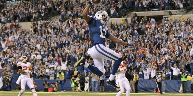January 4, 2014: Indianapolis Colts wide receiver T.Y. Hilton (13) makes a touchdown to move ahead of Kansas City Chiefs 45-44 during the second half of an NFL wild-card playoff football game in Indianapolis. (AP Photo/AJ Mast)