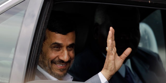 Jan. 11, 2012: Iran's President Mahmoud Ahmadinejad waves from a car after arriving to Jose Marti international airport in Havana, Cuba.