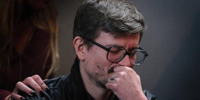 Cartoonist Renald Luzier, known as Luz attends a press conference in Paris, France, Tuesday, Jan. 13, 2015. The surviving staff of Charlie Hebdo is putting out an unprecedented 3 million copies of its upcoming issue. (AP Photo/Christophe Ena)