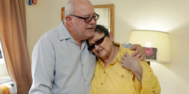 Carmen and Ricardo Ramire at the Bronxwood Home for the Aged, in the Bronx borough of New York.