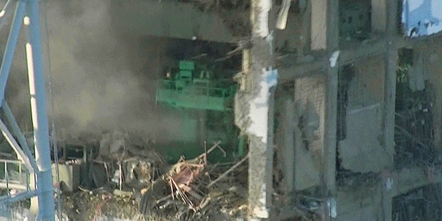 In this photo released on March 16, 2011, by Tokyo Electric Power Co., the top part of the badly damaged No. 4 unit of the Fukushima Dai-ichi nuclear power plant, is shown.